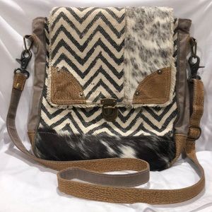 Myra messenger crossbody bag. Cowhide and canvas.